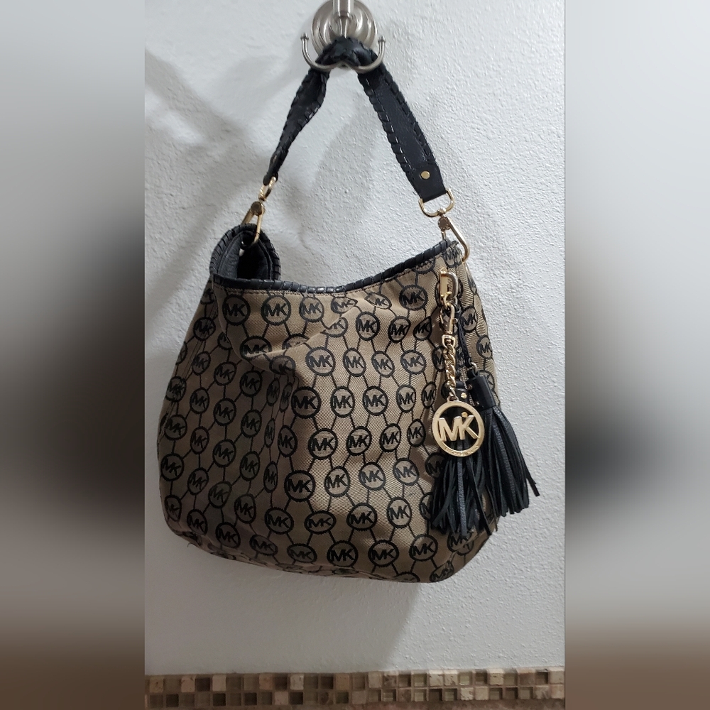 Michael Kors Black and Tan Hobo Bag with Logo Pattern